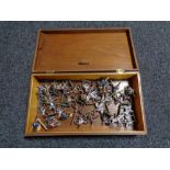 A mahogany box of military figures