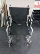 A folding wheel chair