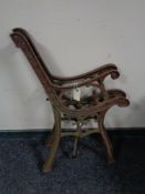 A pair of cast iron bench ends