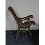 A pair of cast iron bench ends