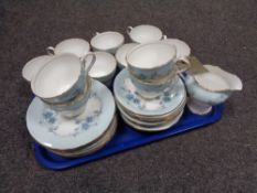 A tray of thirty-four pieces of Aynsley floral tea china