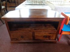A sheesham wood corner tv stand with two drawers