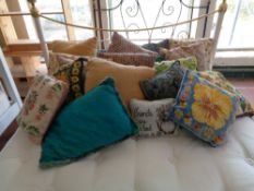 A quantity of assorted cushions