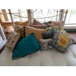 A quantity of assorted cushions