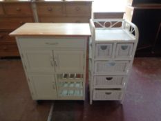 A pine topped kitchen trolley fitted with cupboards,