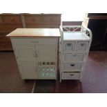 A pine topped kitchen trolley fitted with cupboards,