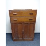 An oak linen cabinet