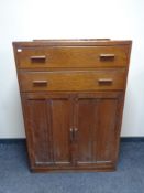 An oak linen cabinet