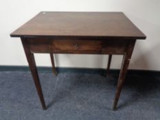 An antique single drawer side table