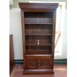 A set of sheesham wood bookshelves