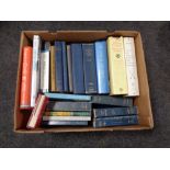 A box of books, pottery reference,