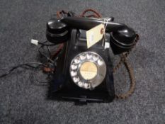 A 1940's black Bakelite telephone (converted)