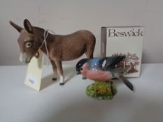 A Beswick donkey and a boxed Beswick bird (2)