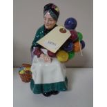 A Royal Doulton figure The Old Balloon Seller,