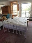 A 5' metal and brass bed frame with John Lewis Natural Collection interior