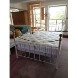 A 5' metal and brass bed frame with John Lewis Natural Collection interior