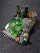 A tray of antique and later glass ware to include glass bottles, chemist's bottles,