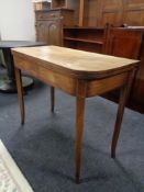 A George III mahogany turnover top tea table