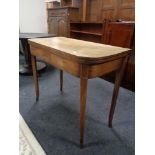 A George III mahogany turnover top tea table