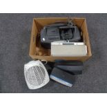 A box of Sony DAB radio, telephones, BT homehubs, heater,