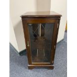 An inlaid mahogany audio cabinet