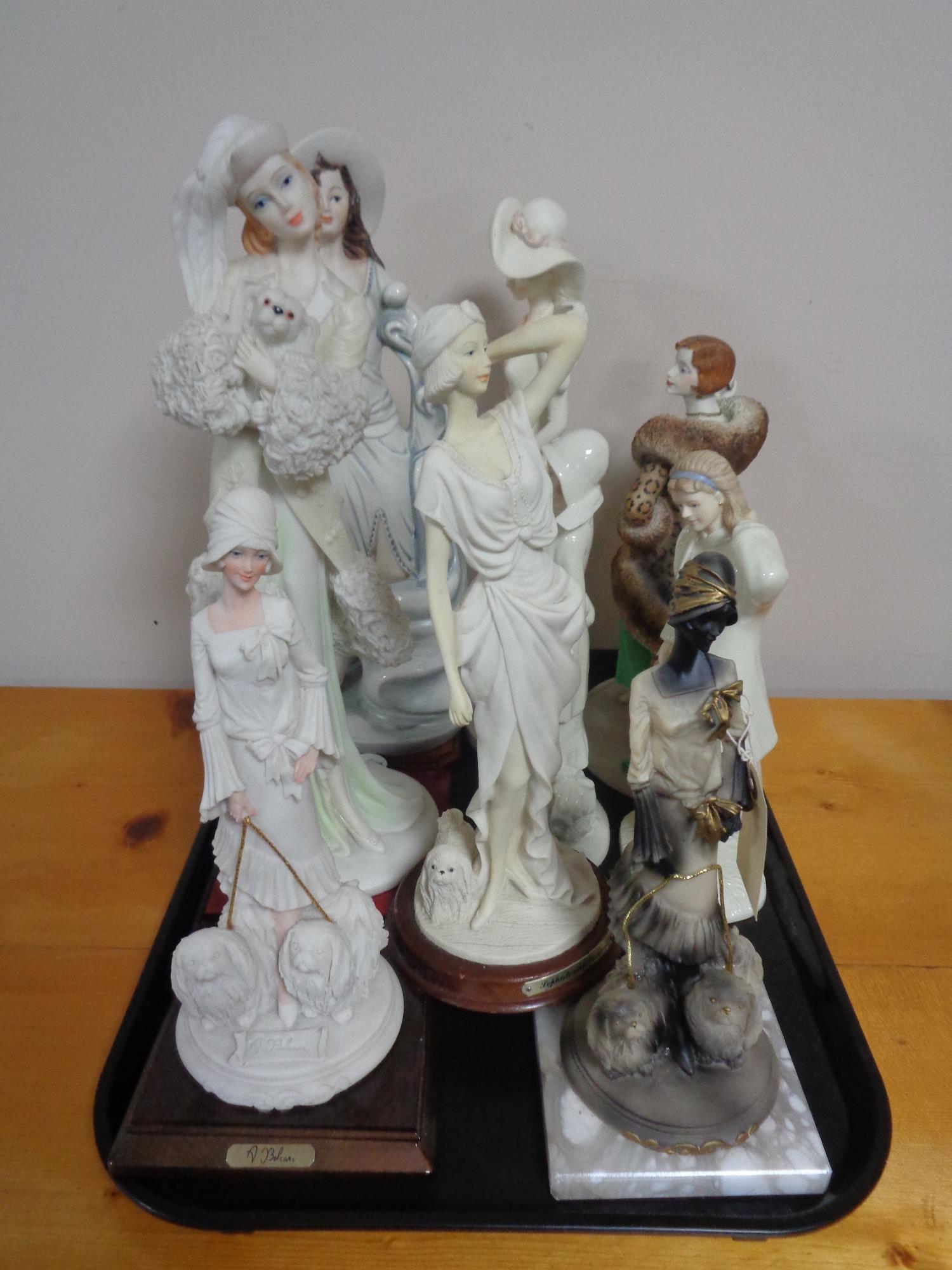 A tray of decorative ornamental modern figures,