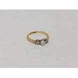 An 18ct gold pearl and diamond ring, size P. CONDITION REPORT: 2.4g.