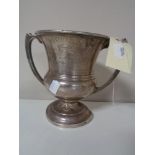 An early 20th century silver twin-handled trophy a/f