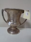 An early 20th century silver twin-handled trophy a/f