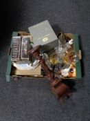 A box of miscellany to include wooden candlesticks, glass ware,