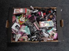 A box of nail polishes and accessories