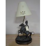A resin figural lamp - Man in military dress on horse, together with further rearing horse figure.