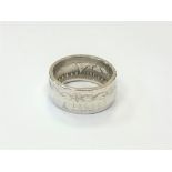 A gent's silver Morgan dollar ring 1891,