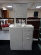 A painted 20th century linen chest and a painted pine side cabinet