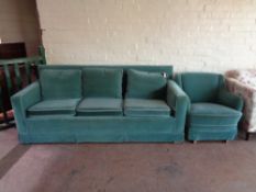 A continental three piece lounge suite in turquoise fabric