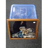 A plastic tub and a counter top display cabinet containing a quantity of assorted costume jewellery