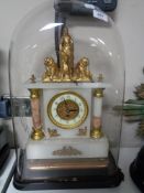 An antique gilt and alabaster mantel clock surmounted by Britannia with three lions,