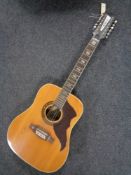 An Eko 12 string acoustic guitar