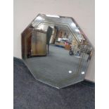 An octagonal unframed Art Deco mirror