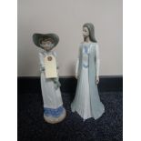 Two large Nao figures - girl with bonnet and lady in flowing dress