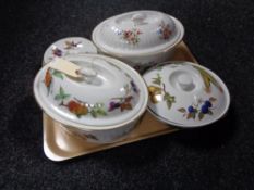 A tray of three Royal Worcester lidded oven dishes and four saucers