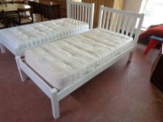 A 3' white bed frame with feather and black shelly 3' mattress