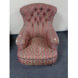 An antique armchair in classical stripe fabric a/f