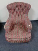 An antique armchair in classical stripe fabric a/f