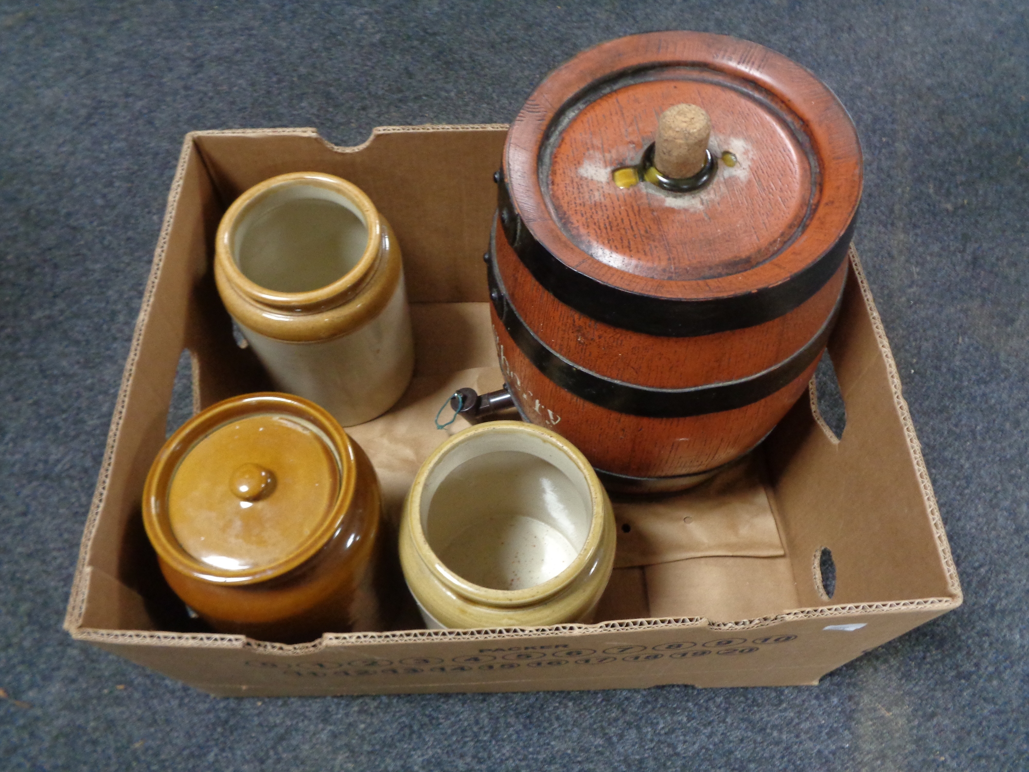 A box of sherry barrel, three stoneware kitchen jars,