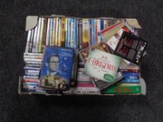 Two boxes of cds and dvds