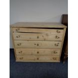 A nineteenth century pine five drawer chest