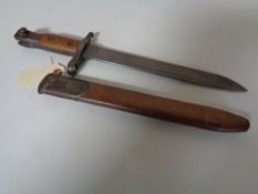 A First World War Ross Rifle Company bayonet in scabbard,