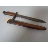 A First World War Ross Rifle Company bayonet in scabbard,