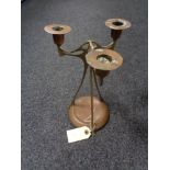 An elegant copper and brass Art Nouveau candelabra, hand signed and dated December 1893.